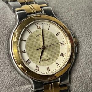 SEIKO DOLCE, 1980er vintage Damenuhr, Gold/Silber Stahlband